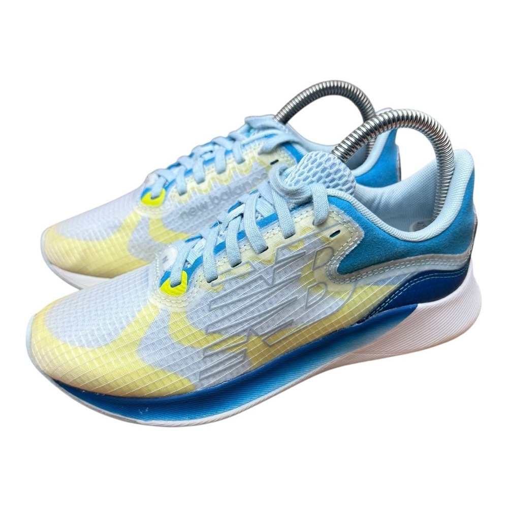 New Balance women size 7 Light Blue and Yellow Running Shoes